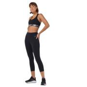 Pernas femininas de cintura alta New Balance Sport Capri